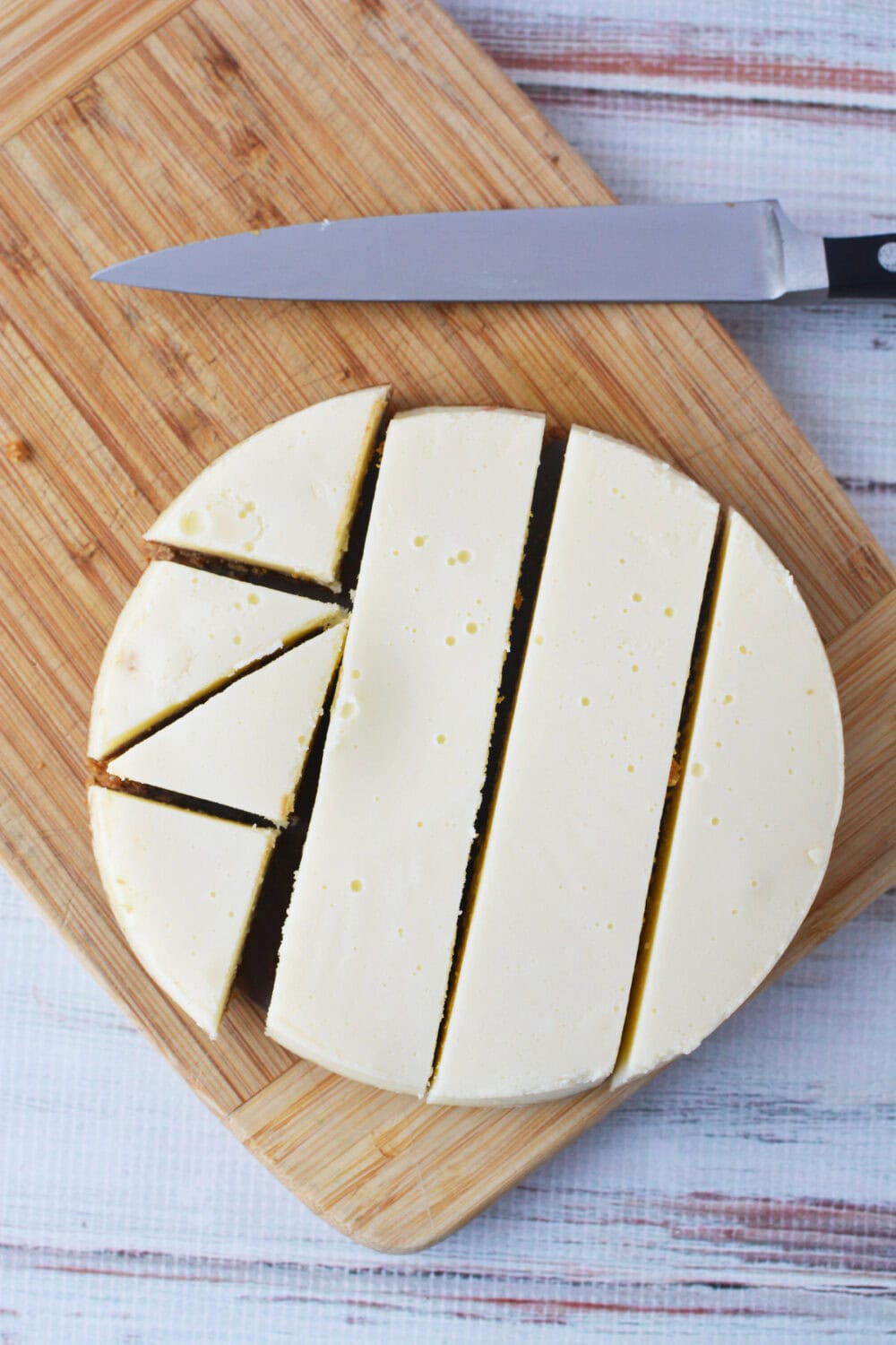 Cheesecake cut into strips and slices.