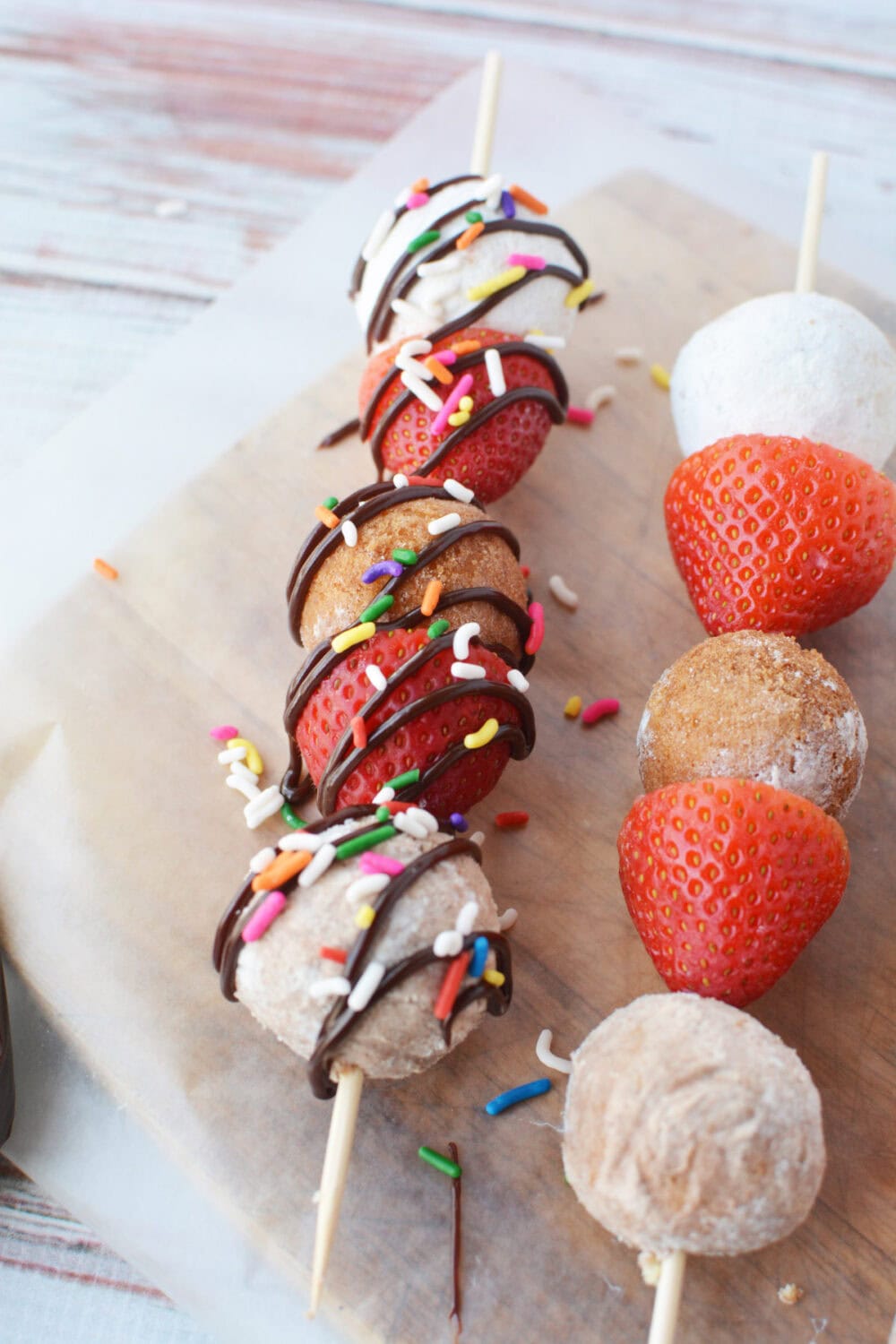 Sprinkles on donut kabobs.