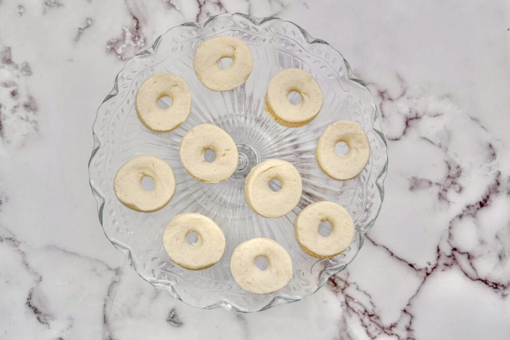 Biscuits with holes cut out of the centers.