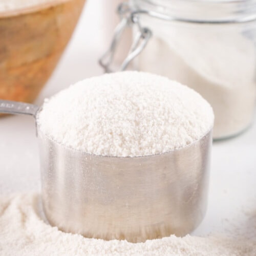 Rice flour in a measuring cup.