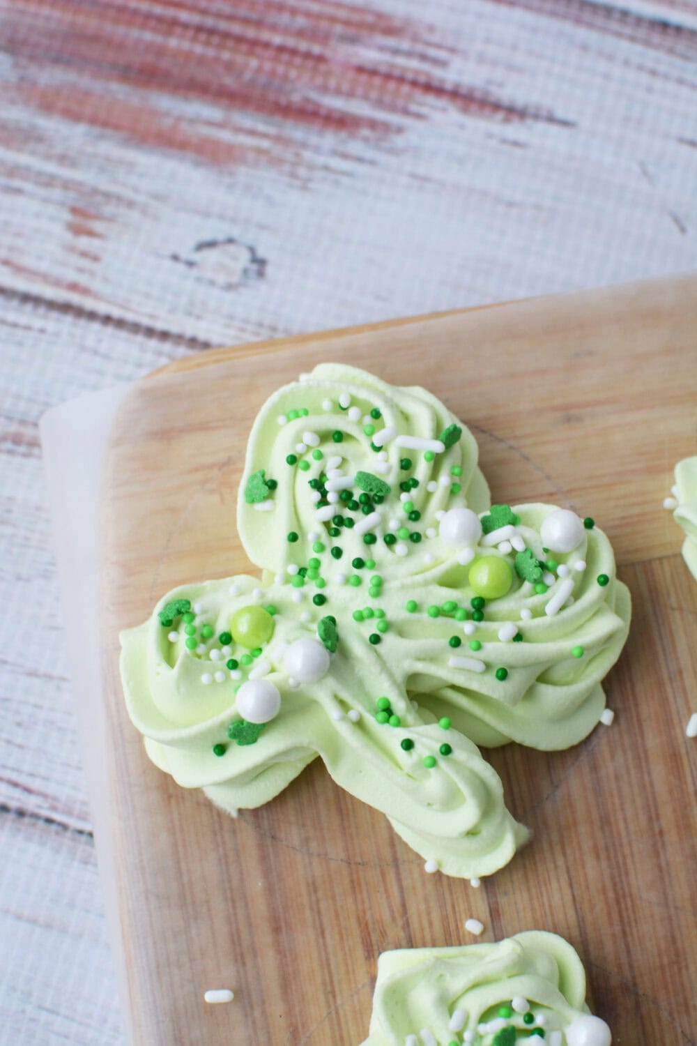 Sprinkles on a whipped cream shamrock.