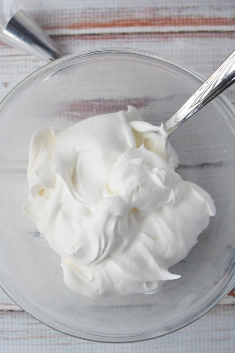 Whipped topping in a mixing bowl.