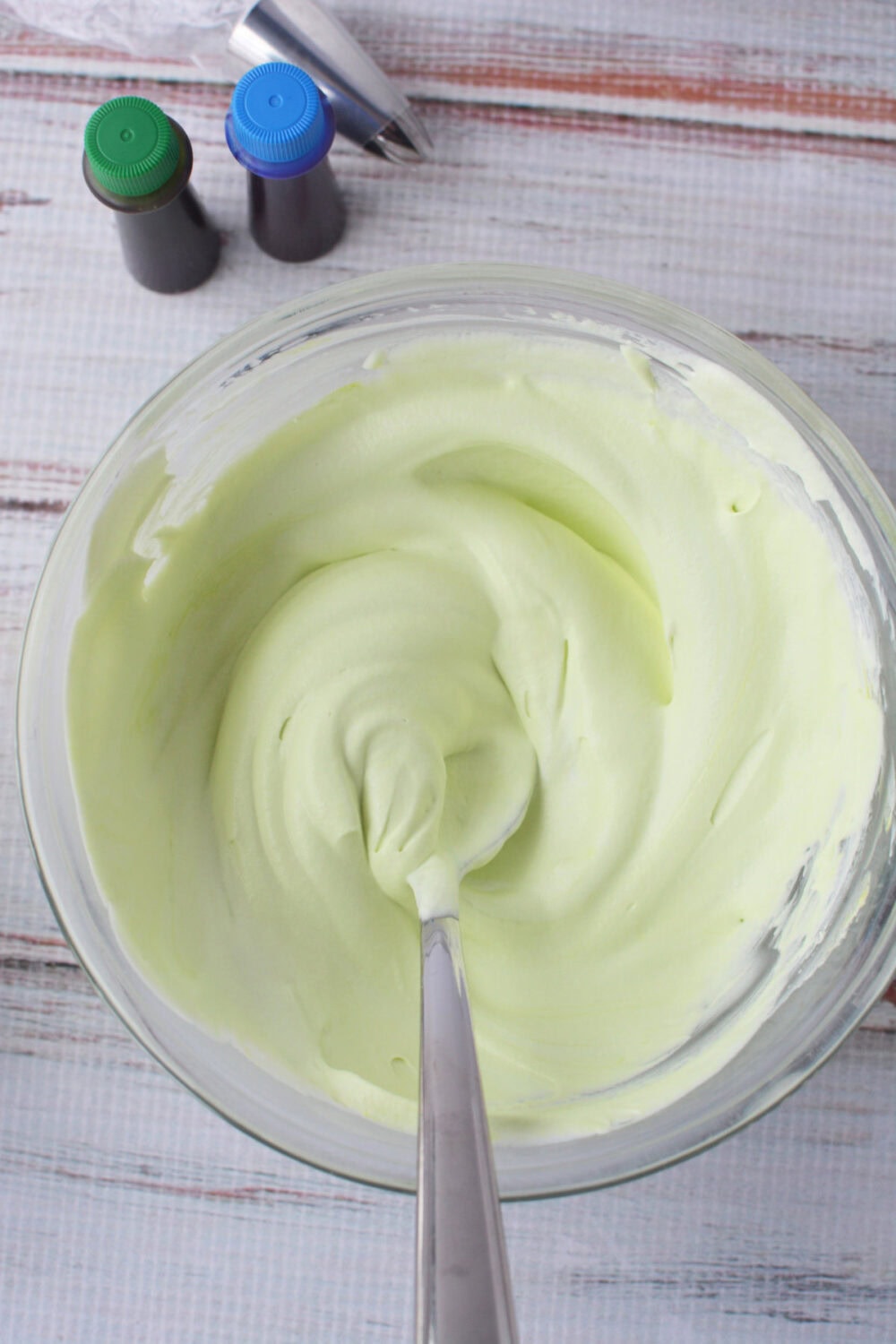 Green whipped topping in a bowl.