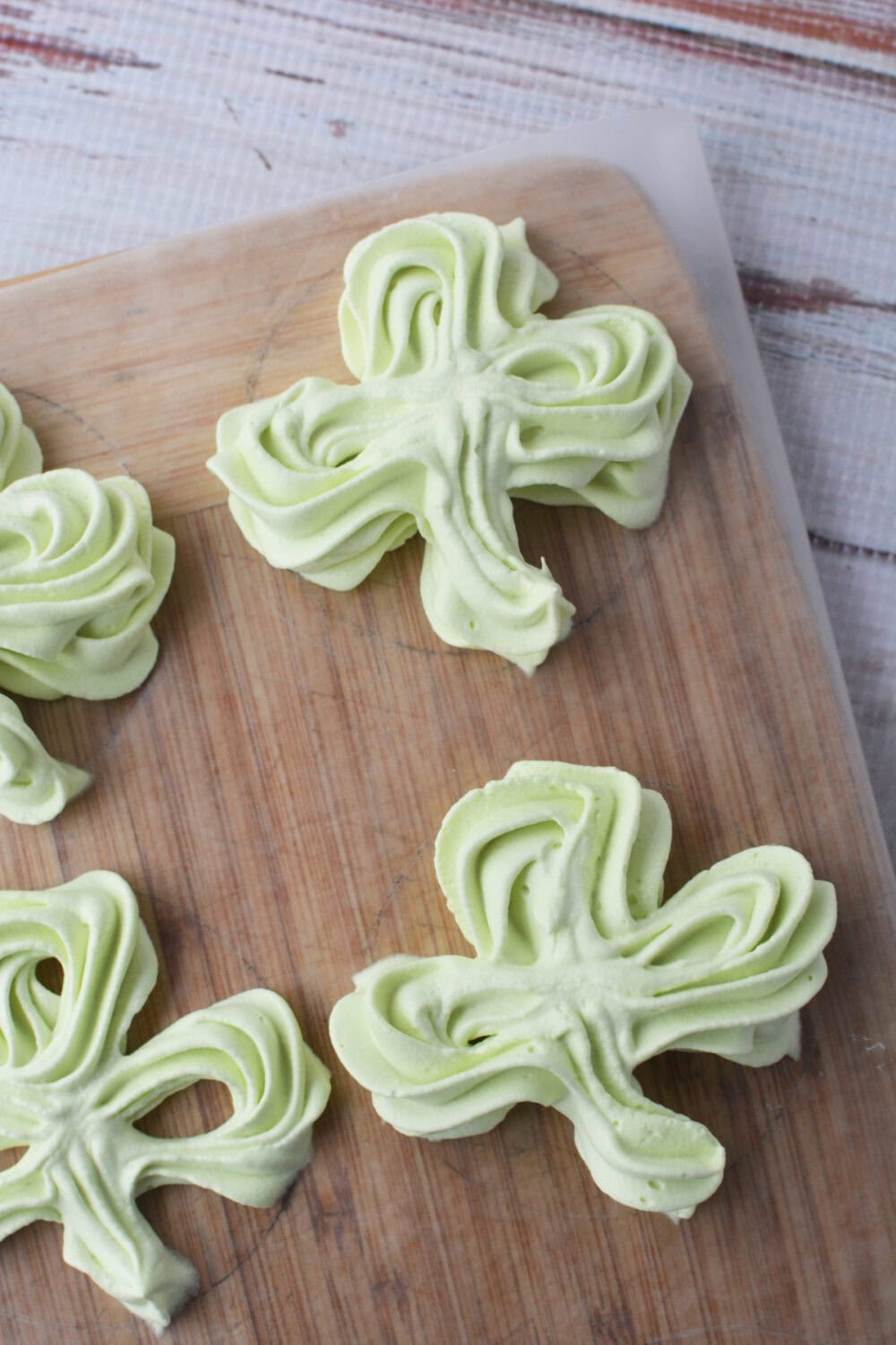 Second layer of whipped cream shamrocks.