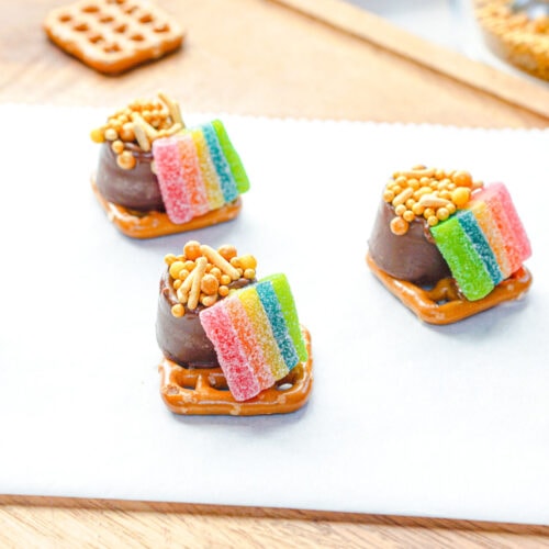 Pretzels with Rolo candies, gold sprinkles, and rainbow gummies.