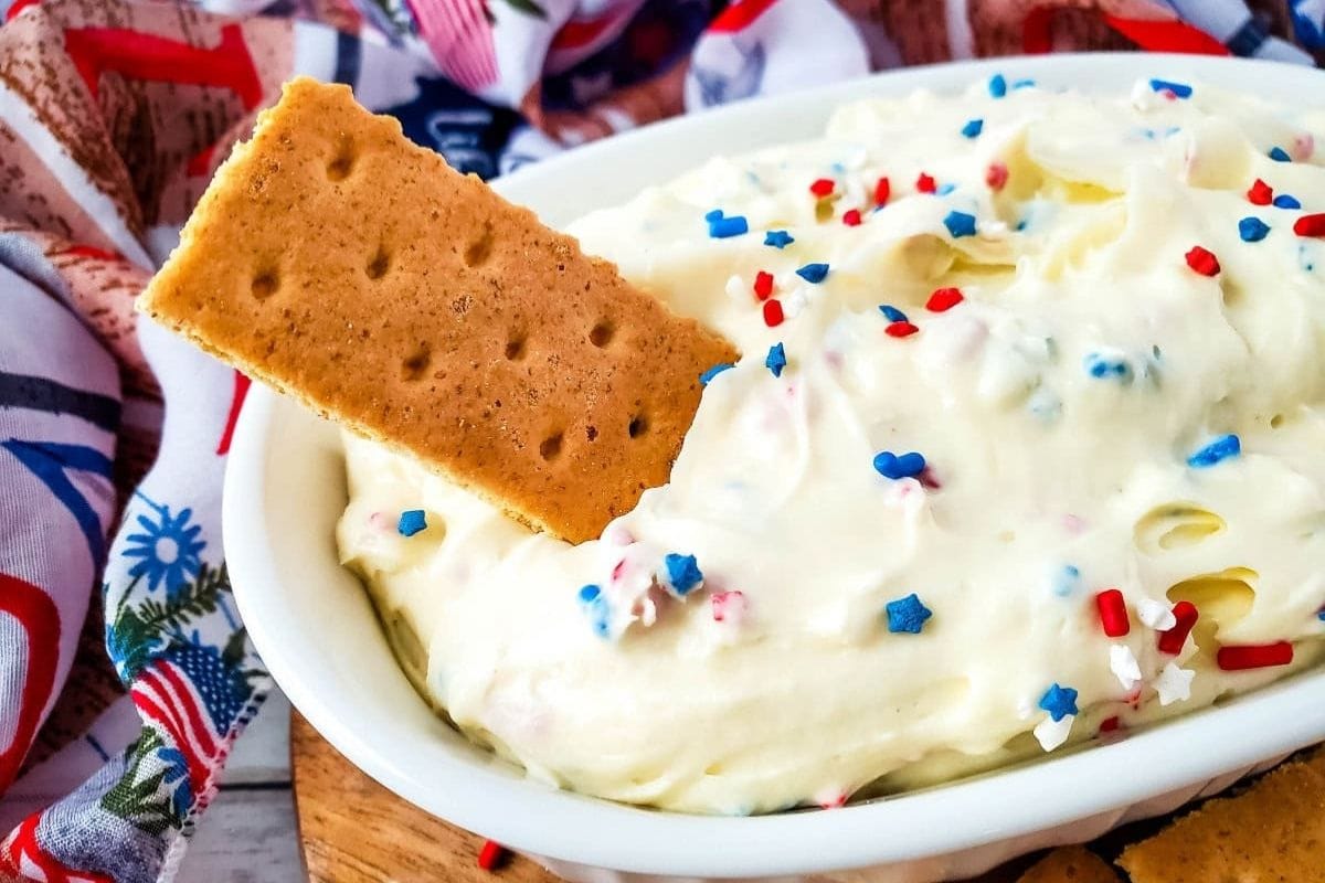 cheesecake dip with red, white, and blue star sprinkles