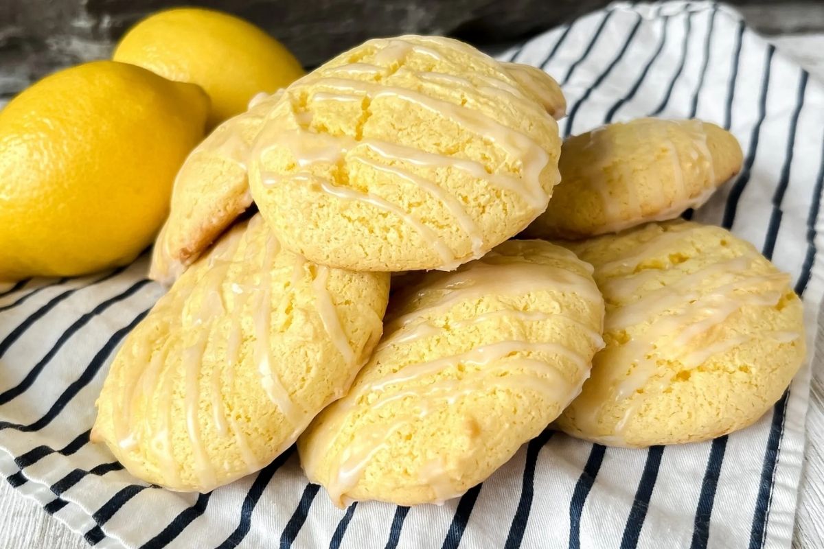 lemon cake mix cookies piled on a napkin