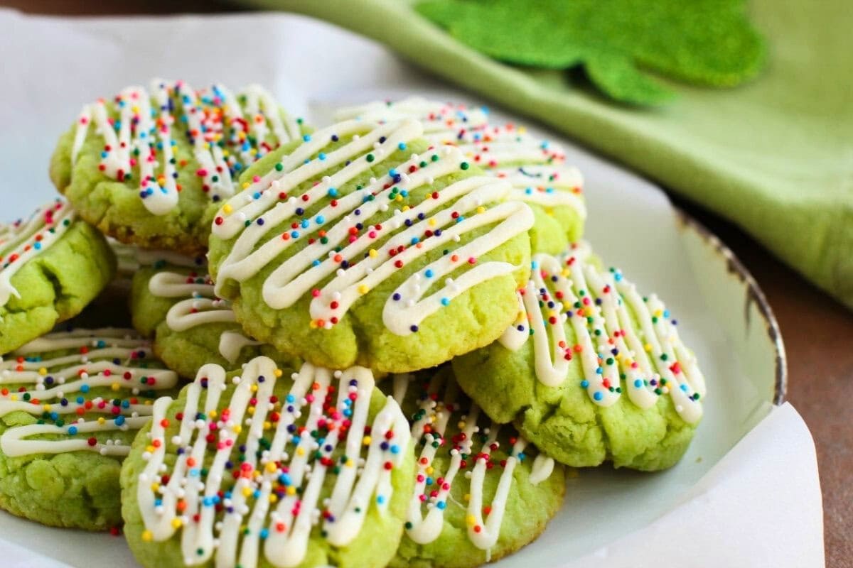 lime cake mix cookies piled onto a plate