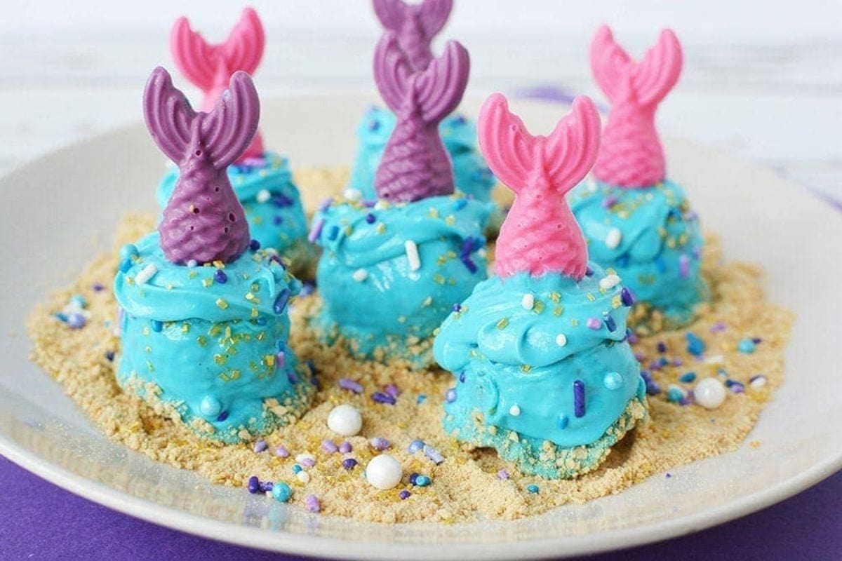 donut holes with a candy coating and mermaid fin