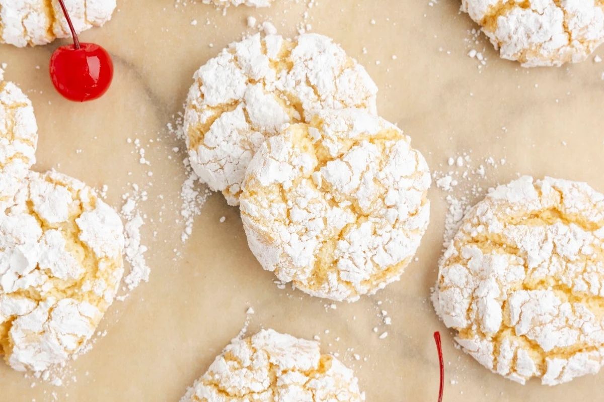 pineapple cake mix cookies on a baking sheet