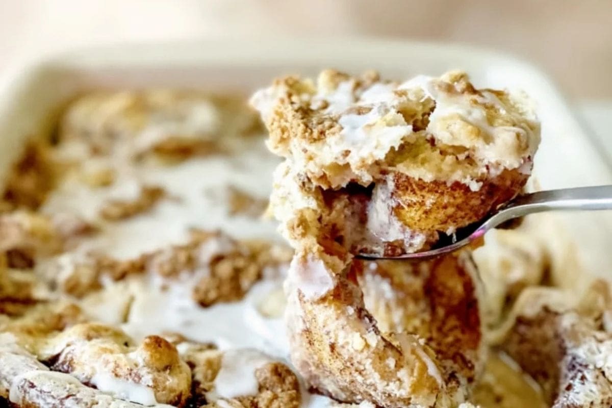 fork full of cinnamon roll casserole
