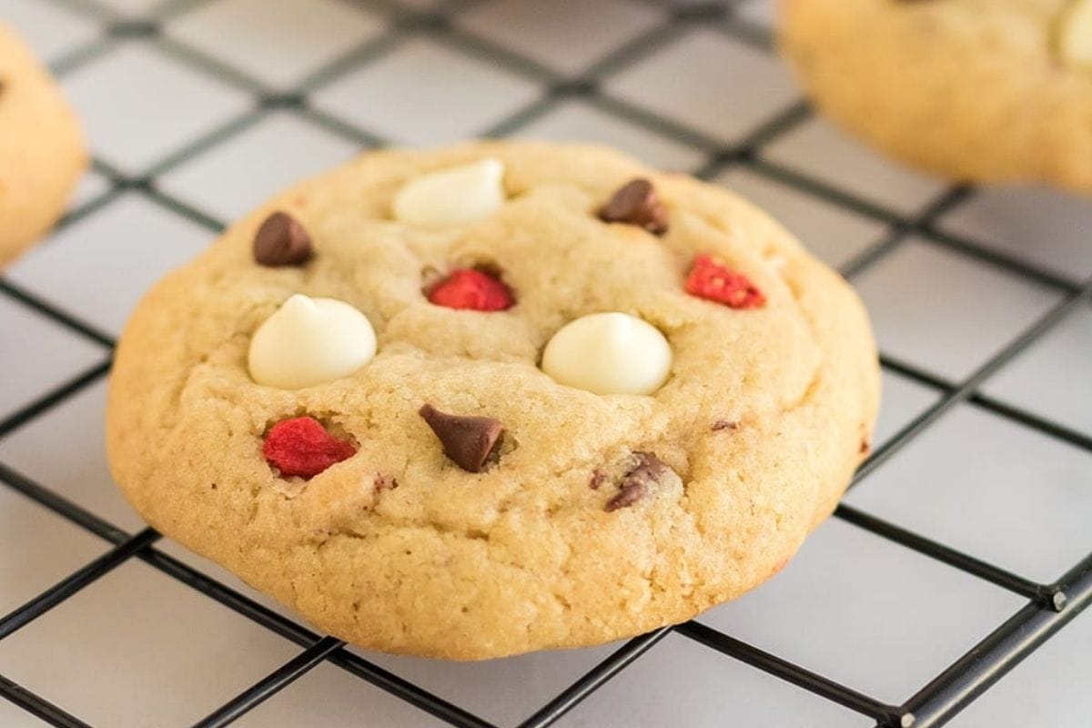 strawberry chocolate chip cookies on a rack