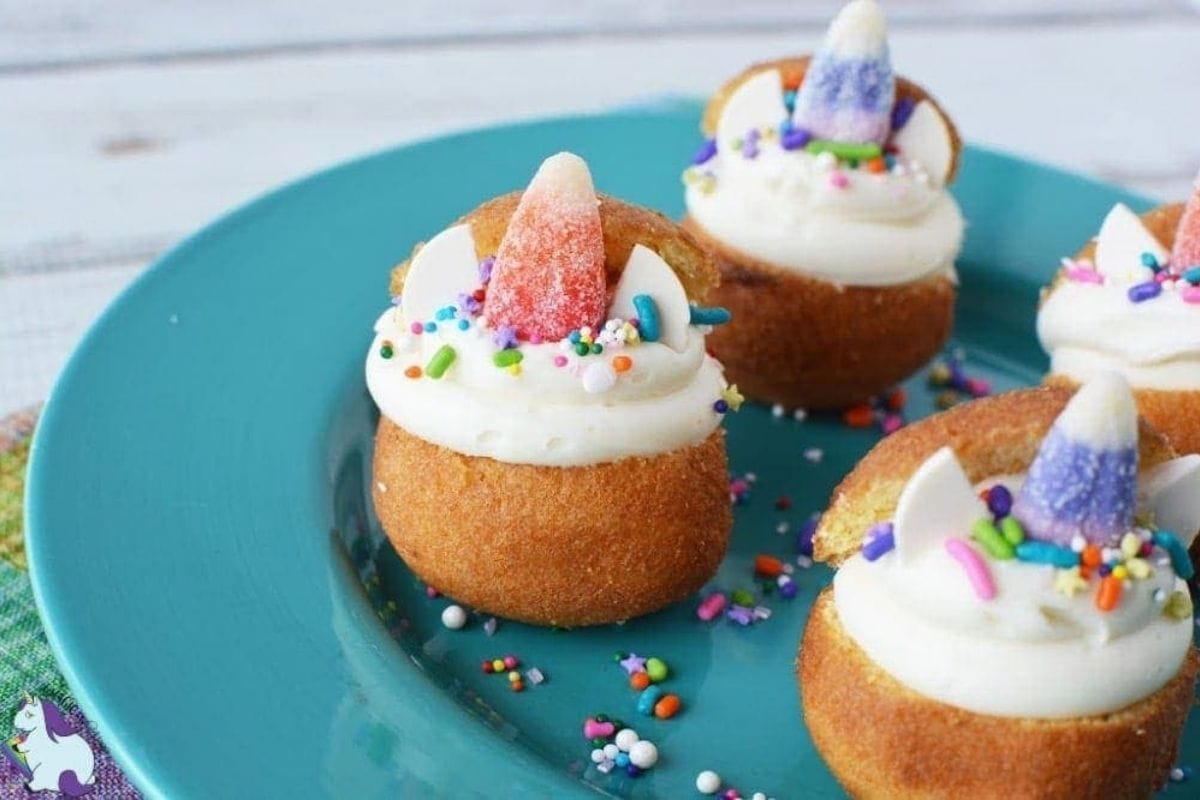 unicorn donut holes on a blue plate