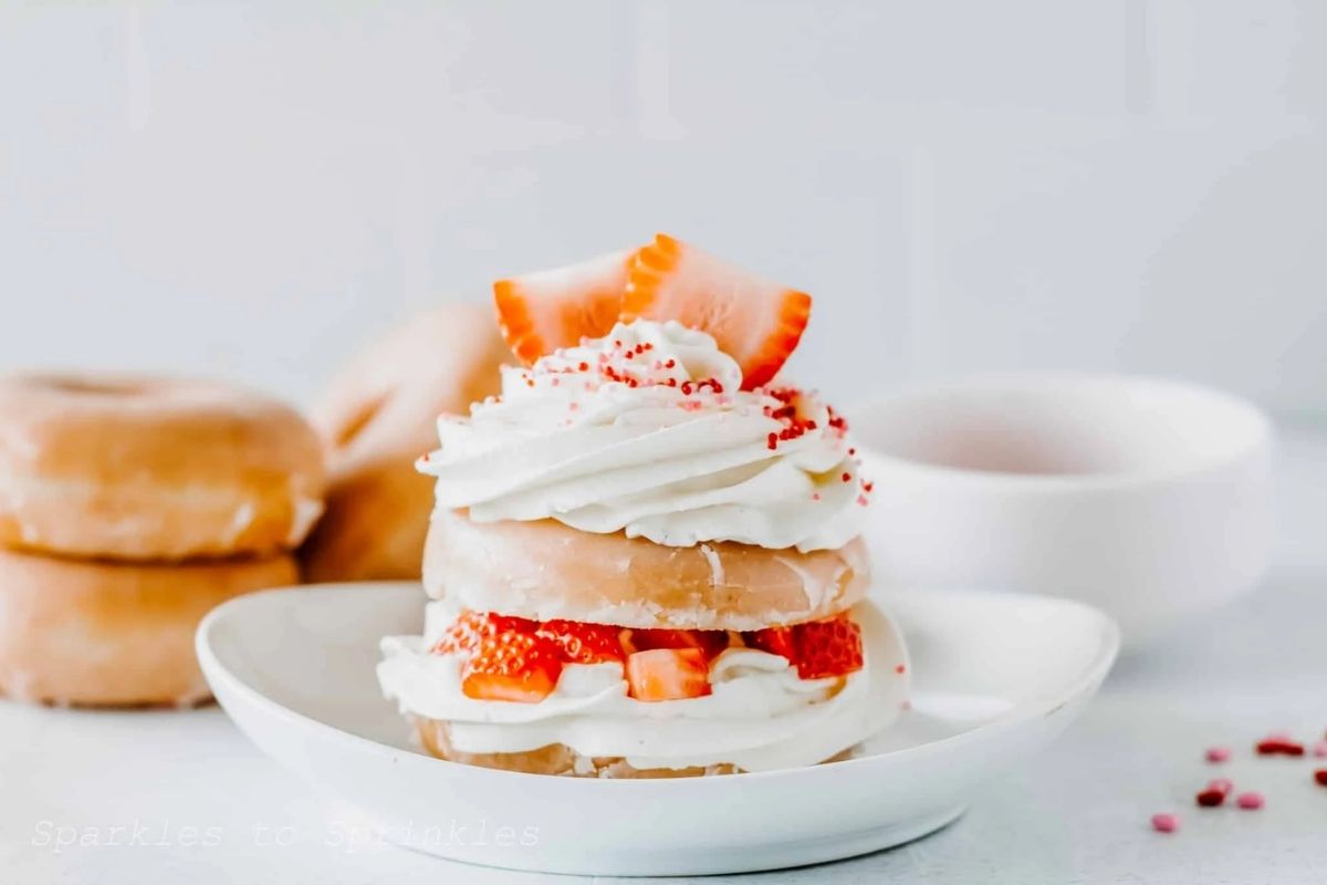 strawberry cheesecake donut on a plate