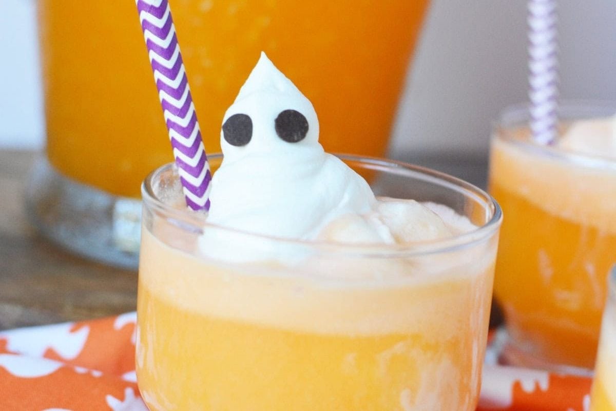 orange punch with a whipped cream ghost