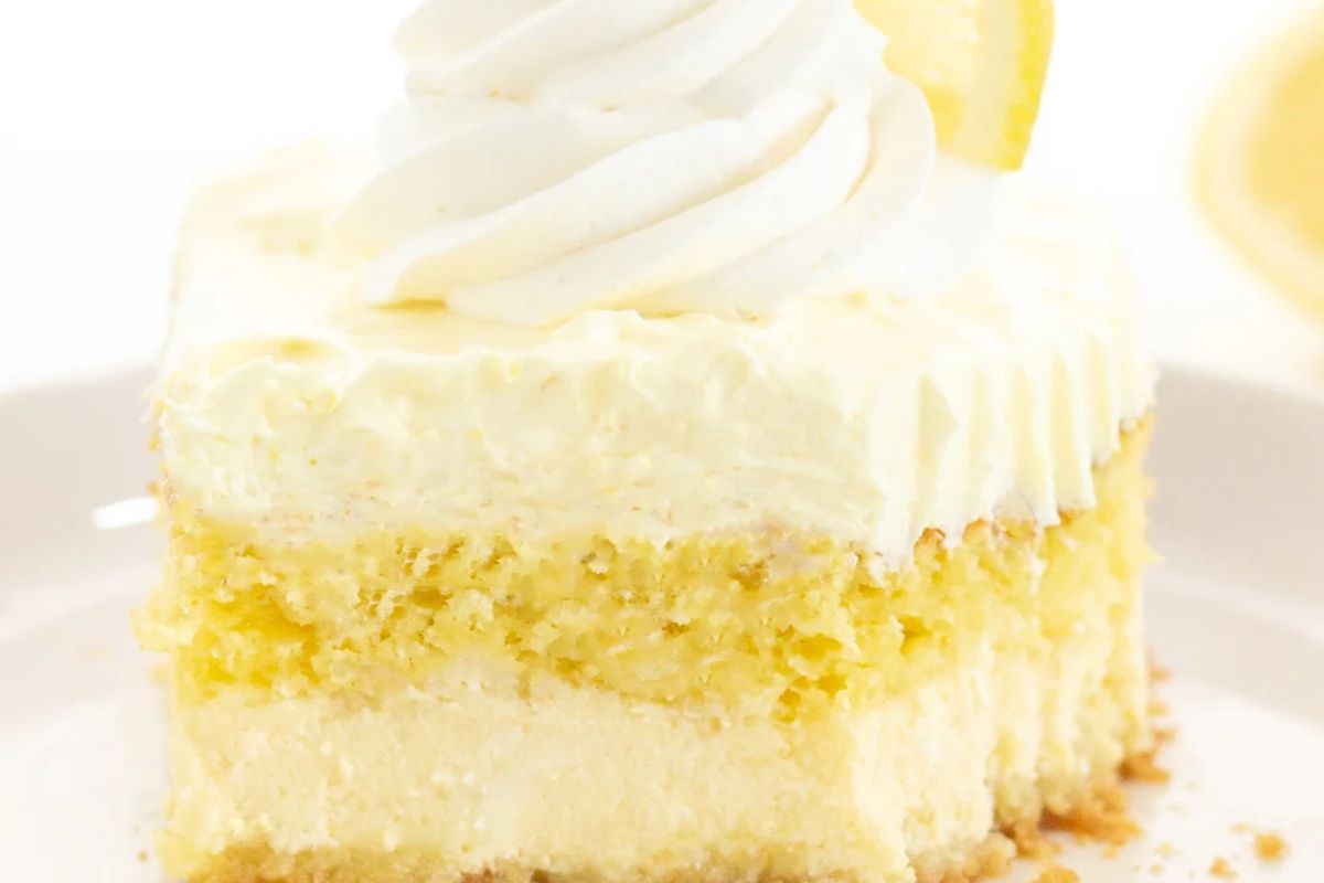 slice of lemon love cake on a plate