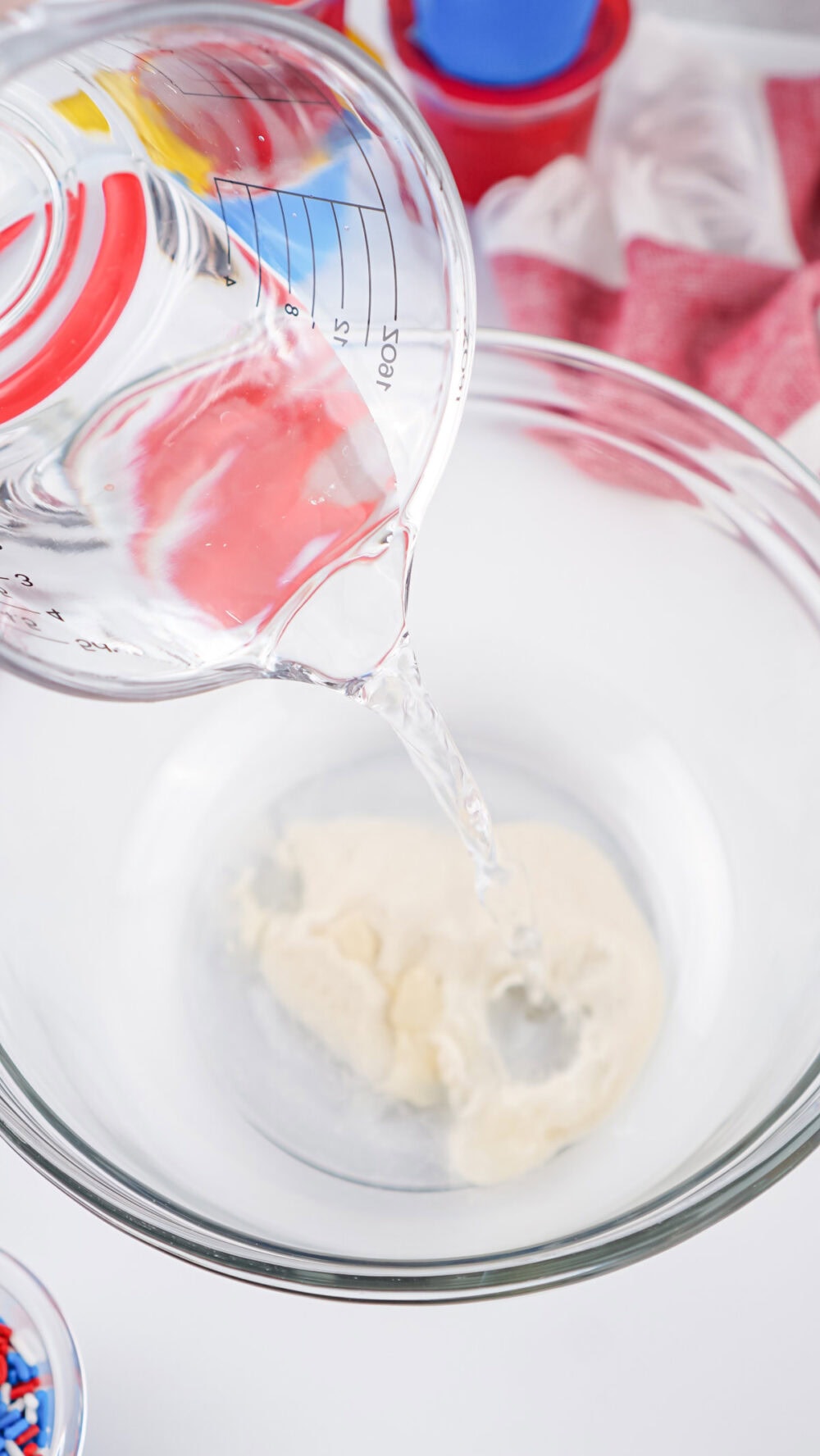 pouring water over gelatin