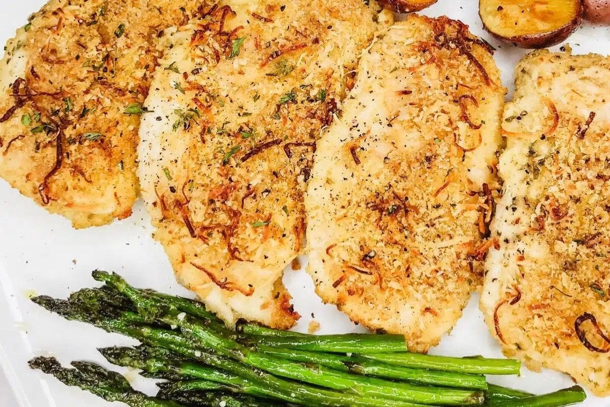 chicken and asparagus on a plate
