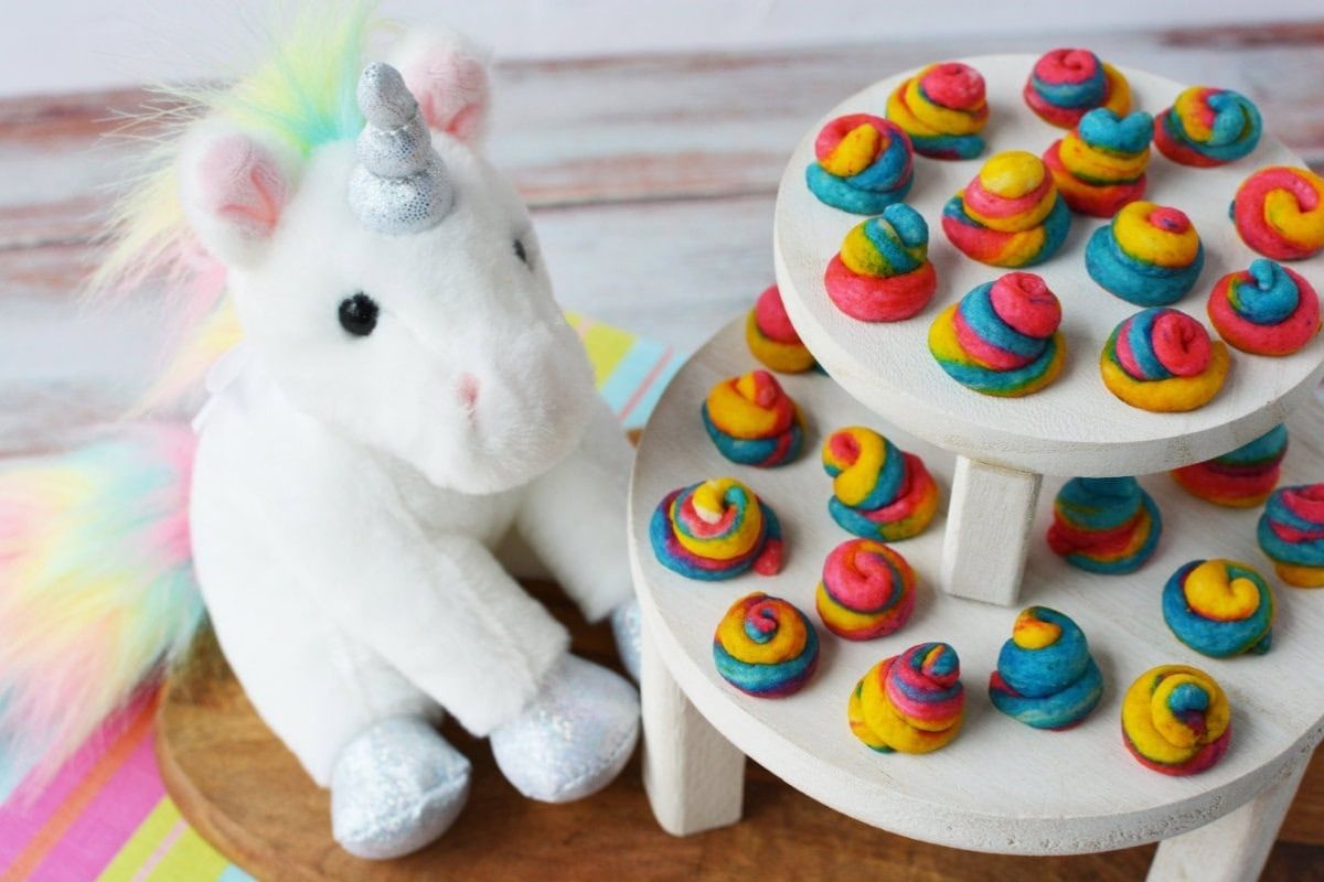 unicorn swirly cookies on a tiered stand