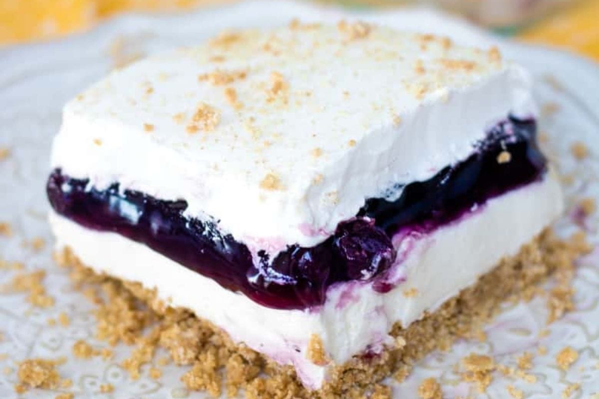blueberry lush cake on a plate