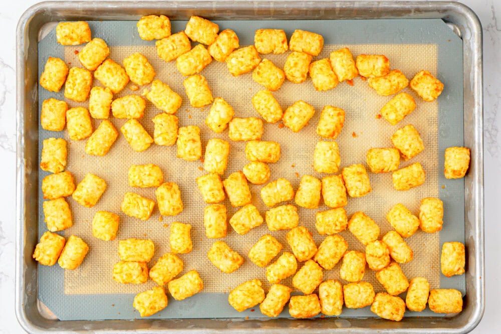 baked tater tots on a baking sheet