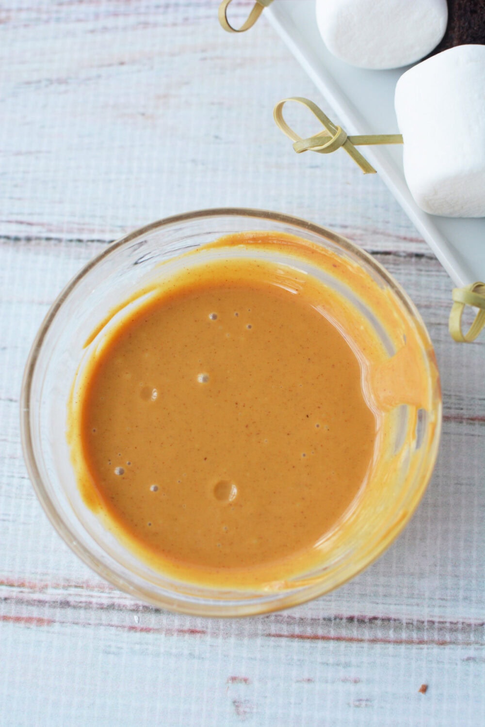 melted peanut butter in a bowl
