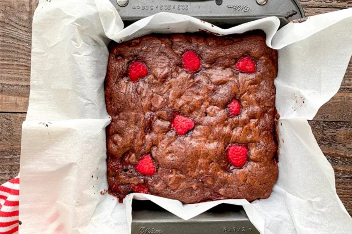 brownies with raspberries in a pan
