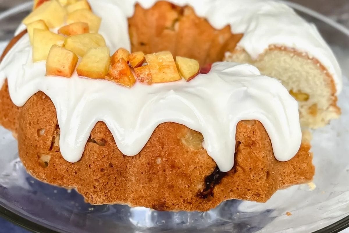 bundt cake with peaches on top