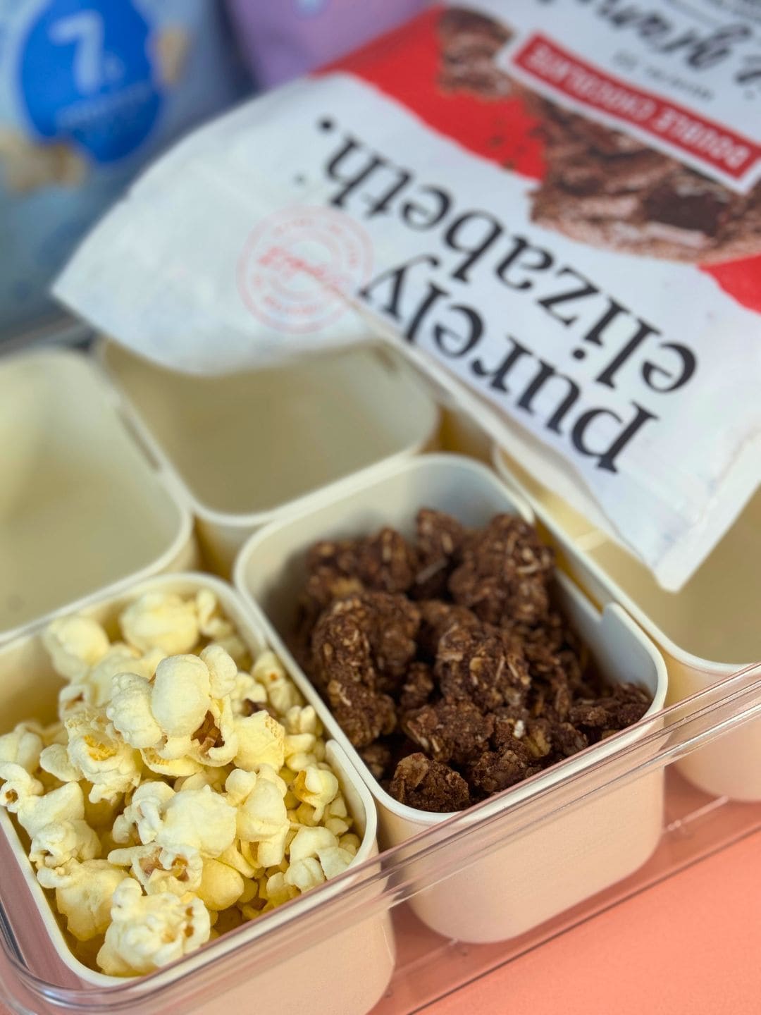 popcorn and chocolate granola in a snacklebox