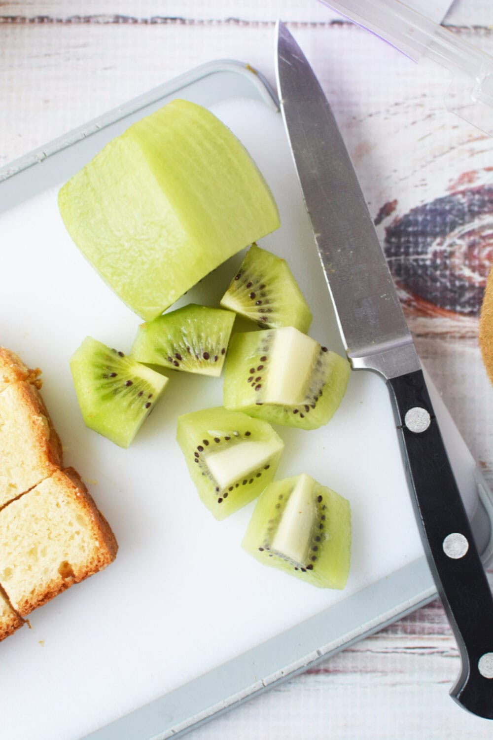 sliced kiwi on a board