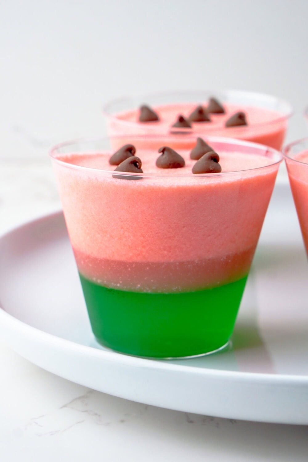gelatin layered to look like watermelon in plastic cups