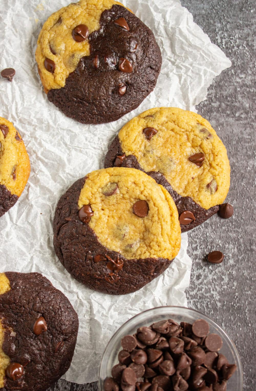 Chocolate chip and brownie mashup cookies on a table