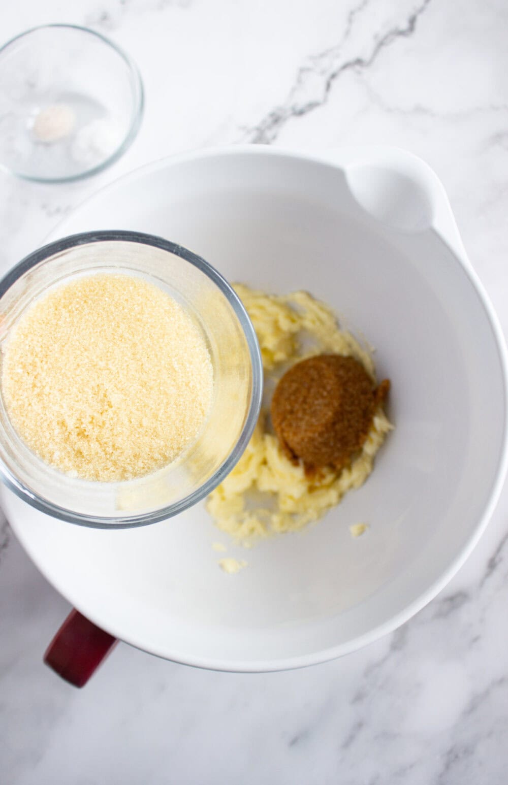 Sugar going into mixing bowl