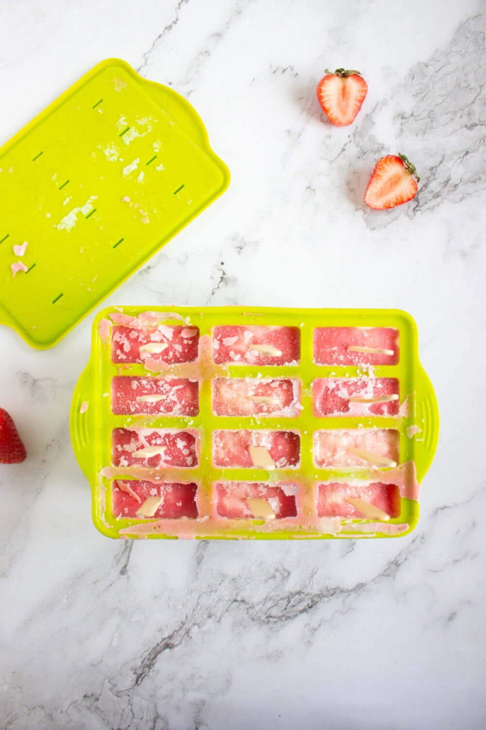 frozen strawberry yogurt pops in the mold