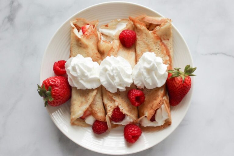 crepes with berries and whipped cream